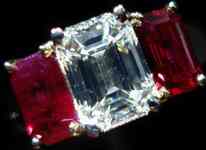 SOLD....Three Stone Ruby and Diamond Ring: 1.25carat K/SI1 Emerald Cut Diamond GIA Report R1865