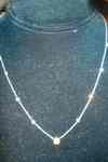 SOLD... Diamond necklace: Diamonds by the Yard Featuring an Intense Yellow Center Stone R2331