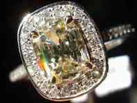 SOLD.....Halo Diamond Ring: Platinum Microset w .73ct Faint Brown/Yellow Cushion R2603