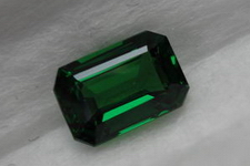 SOLD.....Halo Tsavorite Ring: 1.51 Emerald Cut luscious green color 18kt white gold R3511