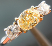 SOLD....Three Stone Ring: .53ct Oval Shape Fancy Yellow VS1 Diamond 18K White and Yellow Gold R4268 