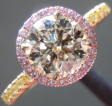 SOLD....Crafted by Infinity Round Brilliant Diamond 1.01 N/SI1 set in a Pink/Yellow Diamond Halo AGSL R4438