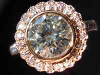 SOLD.....Pink Diamond Ring: Pink Dimaond Flower featuring a 1.71ct GIA RBC Center R910