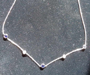 SOLD...1.12cts Blue Round Brilliant Sapphire Necklace R7562
