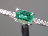 SOLD....0.33ct Emerald Cut Emerald Ring R9826