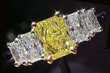 SOLD....Ring- GIA .95ct Intense Radiant Cut Yellow Diamond w/4 White Radiant Side Stones R1537