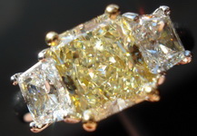 SOLD.....Three Stone Diamond Ring: 1.45ct VVS Radiant Platinum and 18Karat Yellow Gold R1600
