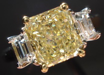 Three Stone Diamond RIng: GIA 1.51ct SI1 Platinum Fancy Light Yellow Diamond ring w/ .47ctw Step Cut R1519