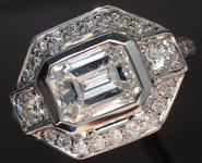 SOLD.....Halo Ring Special: 1.03carat D/I1 Emerald Cut Diamond in a Diamond Halo Ring R1860
