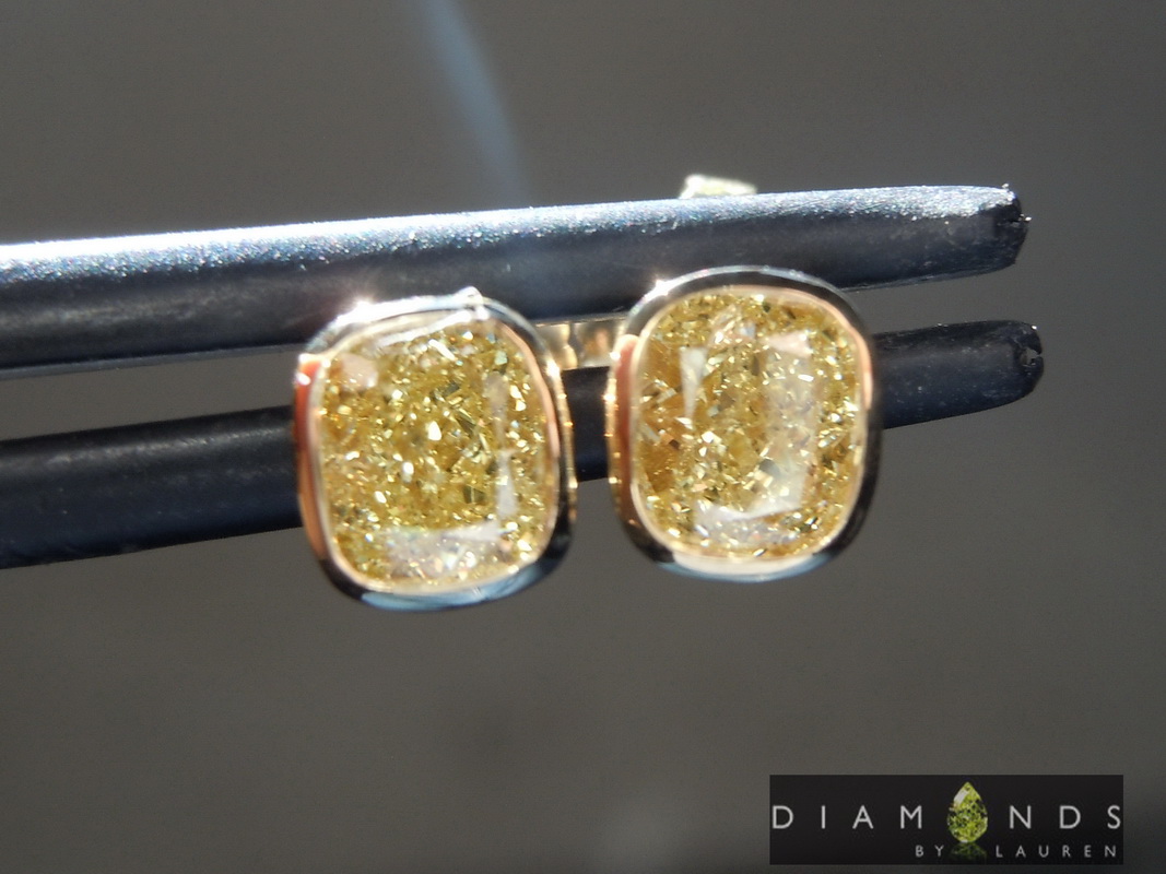 gia yellow diamond earrings