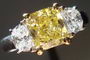 SOLD....Three Stone Diamond Ring: 1.47ct Fancy Brownish Yellow Radiant Diamond Half Moon Sides R2851