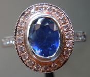 SOLD.....Sapphire and Diamond Ring: .92ct Blue Oval Shape Sapphire Pink Diamond Halo R3046