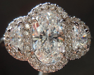 SOLD....Three Stone Ring: 1.01ct Oval Shape F/SI2 Half Moon Side 18K Halo GIA R4315