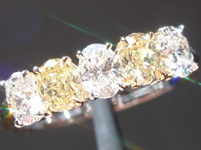 SOLD...1.19ctw Yellow and Colorless Oval Diamond Ring R5144