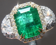 SOLD... Emerald Ring: 5.13ct Emerald Cut Emerald and Diamond Halo Ring R6031