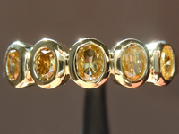 SOLD....0.60ctw Intense Orangy Yellow Oval Diamond Ring R7420