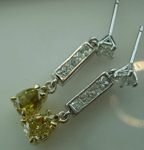 SOLD...1.15ctw Yellow and Colorless Diamond Earrings R7817