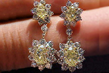 SOLD....Earrings- GIA 6.76tw Yellow Oval Diamond Dangles in Platinum R1337