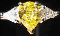 SOLD....Three Stone Diamond Ring : .67ct VS1 Pudgy Pear Fancy Vivid Yellow Diamond Center GIA R1707